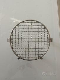 griglia faro Triumph scrambler 