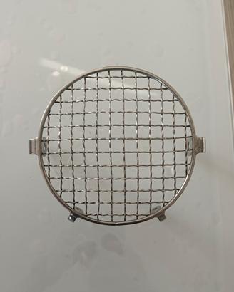 griglia faro Triumph scrambler 