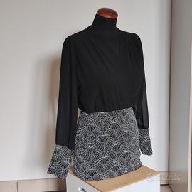 abito elegante con trasparenze e strass 