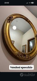 Vendersi specchio antico