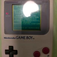 Game boy grigio con gioco mortal kombat