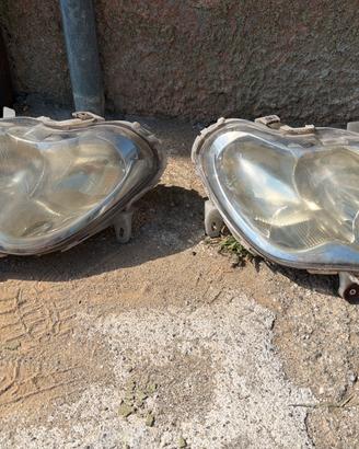 Fanali anteriori a 8 smart 450 e altro.
