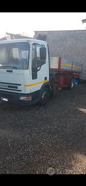 eurocargo ribaltabile trilaterale con gru 