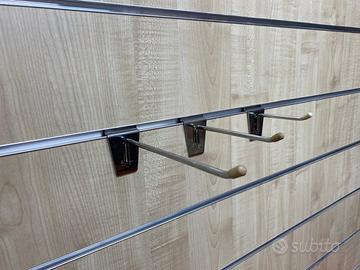 Ganci per pannelli dogati