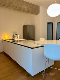 Arredamento completo Veneta cucine, Zalf, Flos