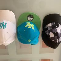 Cappelli New Era e Quicksilver