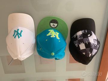 Cappelli New Era e Quicksilver
