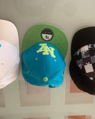 Cappelli New Era e Quicksilver