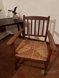 Sedia con seduta in vimini e braccioli