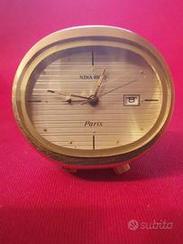 Sveglia da viaggio Nina Ricci placcata oro