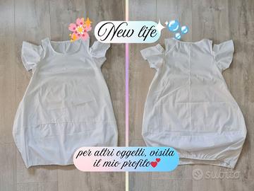 Maglia bianca con spalle scoperte