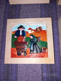 Quadretti in legno intagliato e dipinto