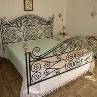 LETTO ANTICO IN FERRO PIENO BATTUTO
