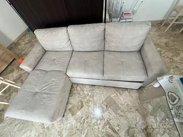 Divano con penisola e funzione letto