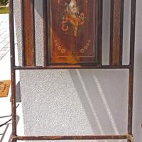 Antico letto in ferro battuto dipinto