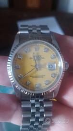 rolex. giallo con brilli