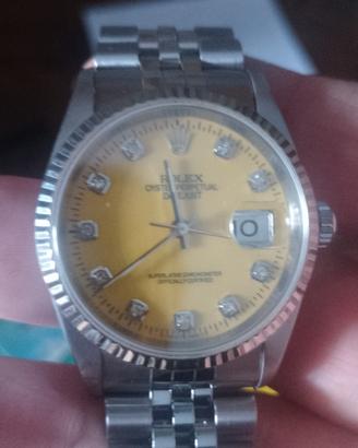 rolex. giallo con brilli