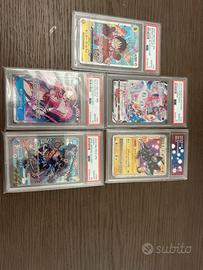 Lotto carte Pokemon e One Piece gradate