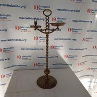 Candeliere in ottone con pinza porta scheggia