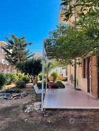 Bilocale con giardino