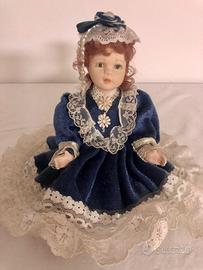 Bambola soprammobile in porcellana + angelo