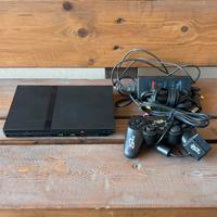 PS2 Slim nera + controller con m.o.d.