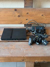 PS2 Slim nera + controller con m.o.d.
