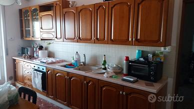 tre ambienti pranzo cucina e stanza da letto 