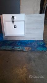 lavabo da appoggio con asse e miscelatore 