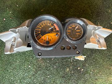 Raro- quadro strumenti + copri manubrio originale