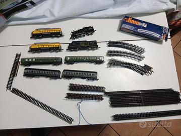 4 locomotori Lima,4 vagoni e binari scala N