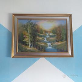 Quadro paesaggio con cascata e tramonto