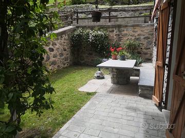 Bilocale in montagna con giardino privato