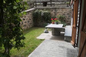 Bilocale in montagna con giardino privato