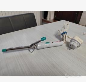 Arriccia capelli Remington 