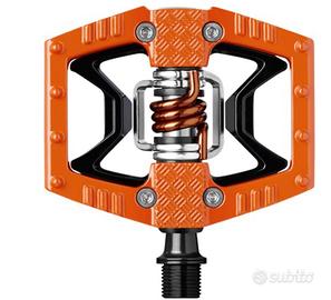 Pedali Crankbrothers arancio e neri