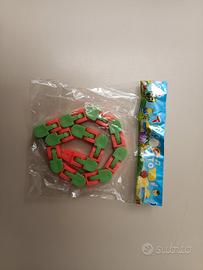 Giochino antistress verde e arancione 