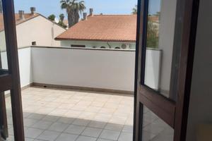 Trilocale con terrazzino al mare
