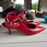 Décolleté pelle rossa nuovo.