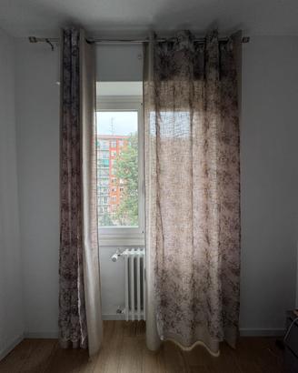 Tende beige con motivo a fiori