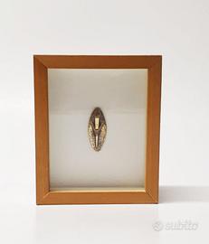 Arnaldo Pomodoro rilievo astratto in teca