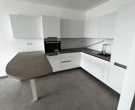 Nuovo e ampio trilocale in elegante condominio