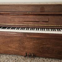 Pianoforte verticale con sgabello