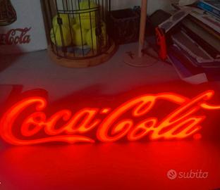 Insegna luminosa Coca Cola