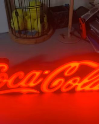 Insegna luminosa Coca Cola