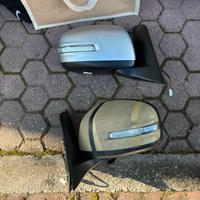 Coppia di specchietti con freccia