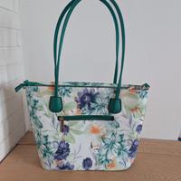 Borsa shopping floreale con dettagli verdi