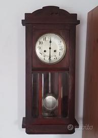 Orologio a pendolo antico da parete