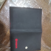 Porta libretto Yamaha pari a nuovo