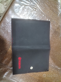 Porta libretto Yamaha pari a nuovo